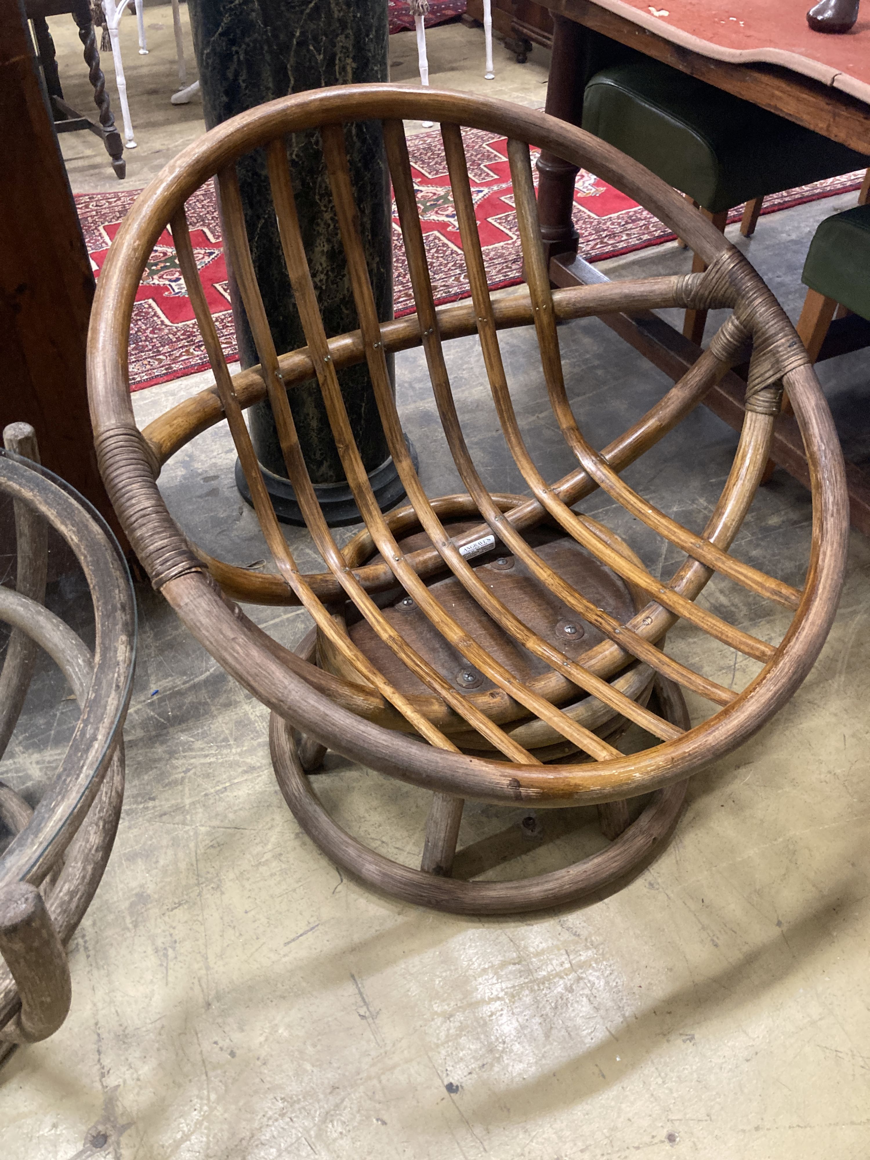 A pair of 1970's Angraves bamboo chairs and an occasional table, 76cm diameter